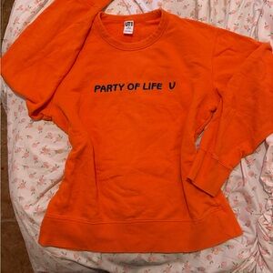 Orange Sweatshirt with Black Text